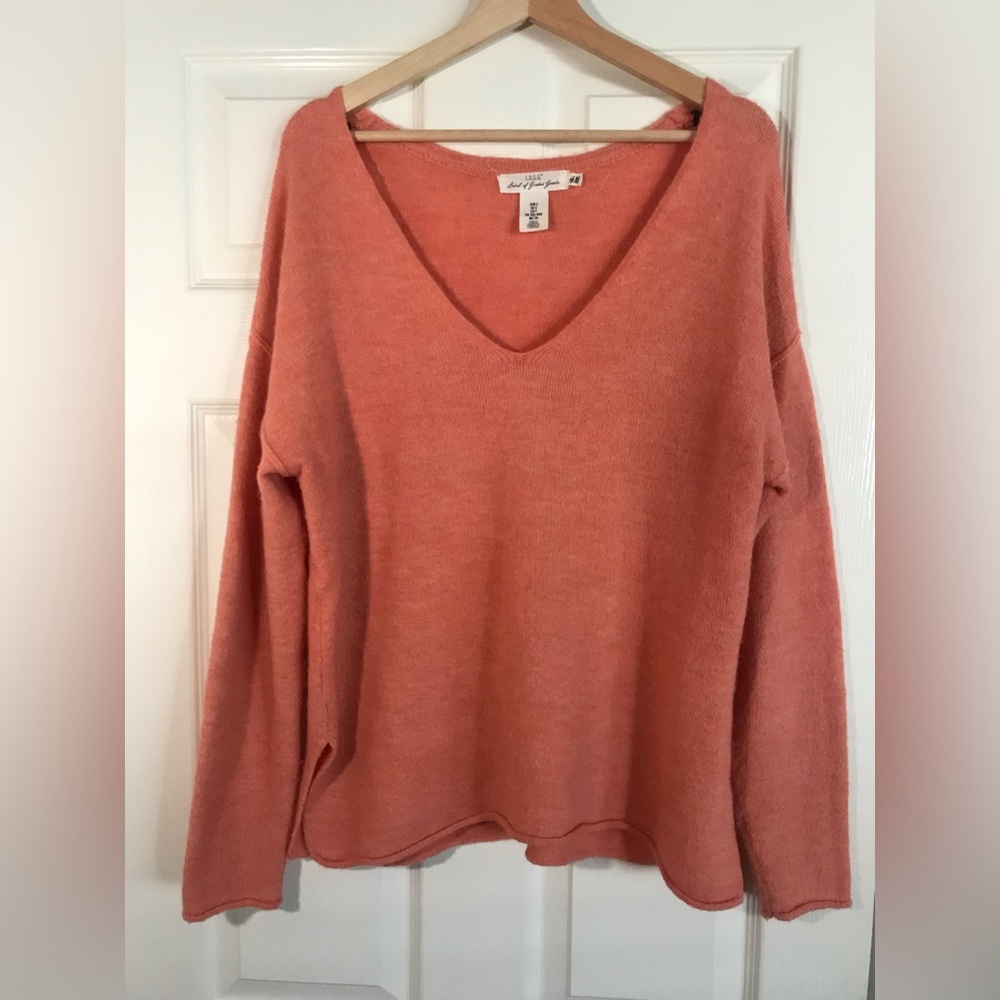 Divided peach sweater
